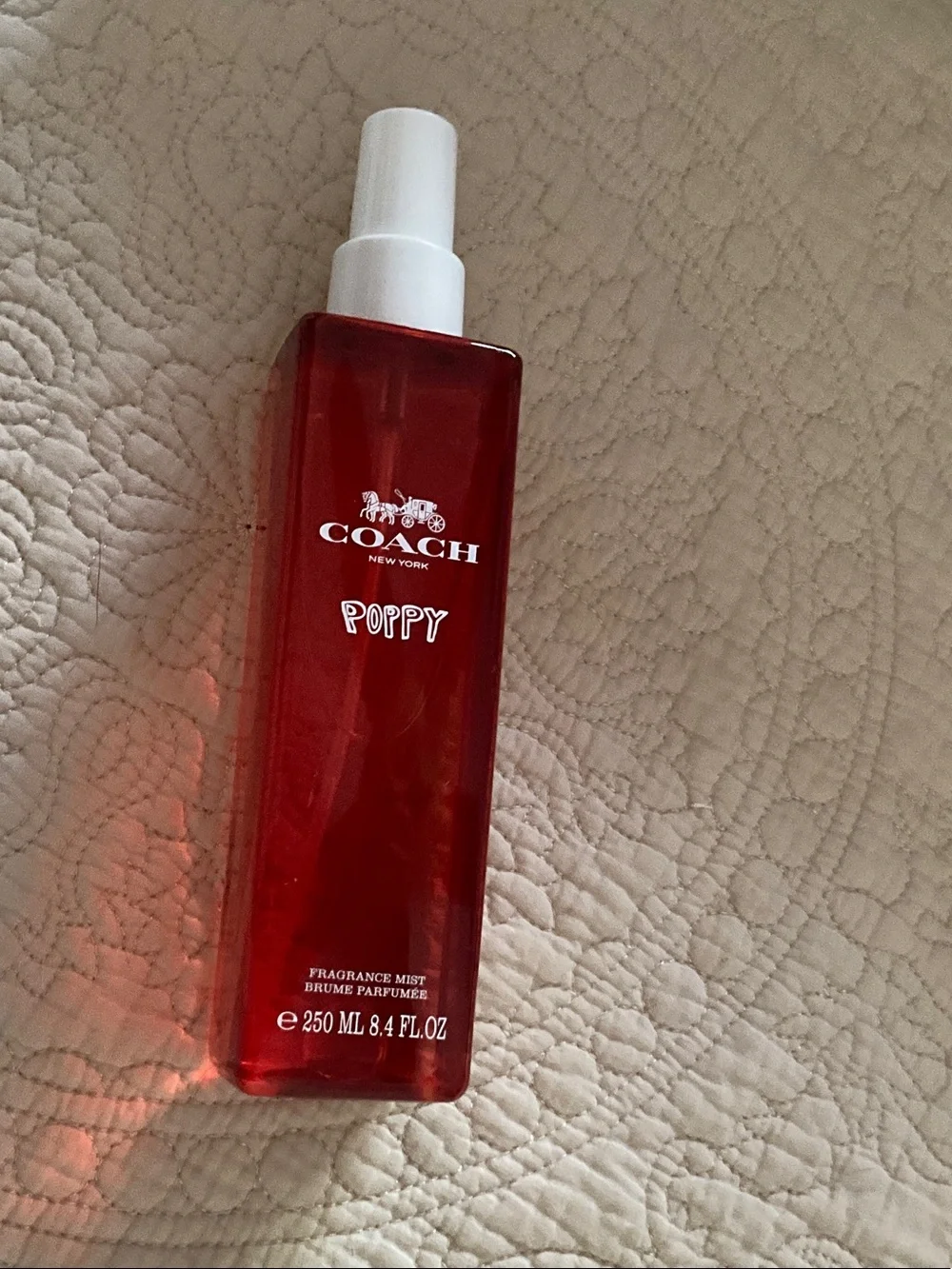 New coach poppy mist.
